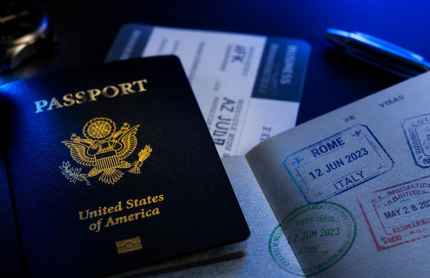 Passport and travel documents on a desk